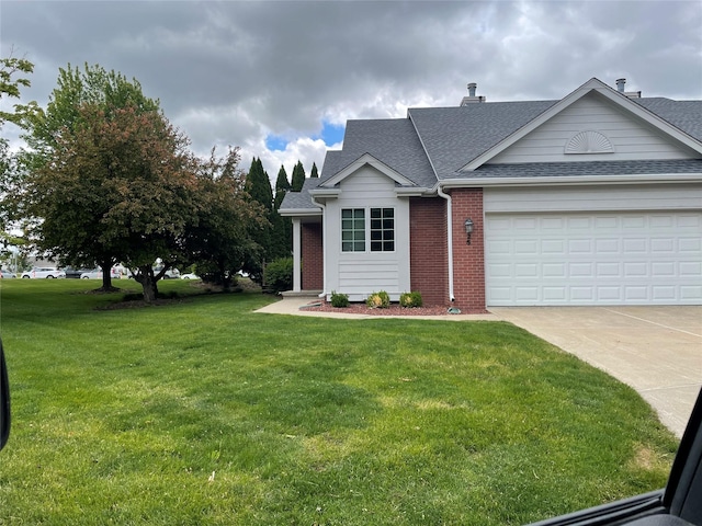 5925 Ep True Pkwy Unit 25, West Des Moines, IA 50266 - view of front facade with brick siding, a front lawn, a shingled roof, an attached garage, and concrete driveway