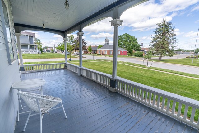 204 W Washington St, Winterset, IA 50273 - porch with a yard and a residential view