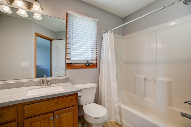 full bathroom with shower / bath combo with shower curtain, vanity, and toilet