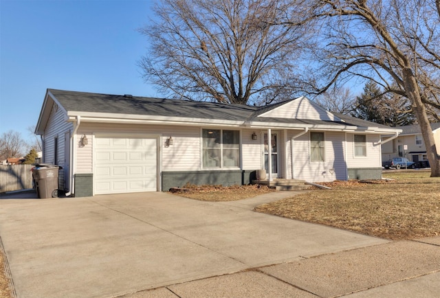 ranch-style home with a garage