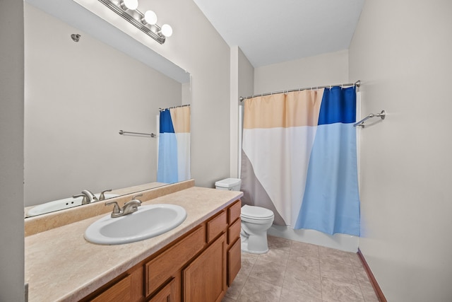 full bathroom featuring shower / bath combo, vanity, and toilet