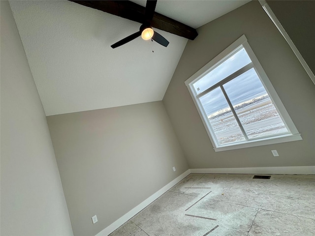 additional living space featuring ceiling fan and vaulted ceiling with beams