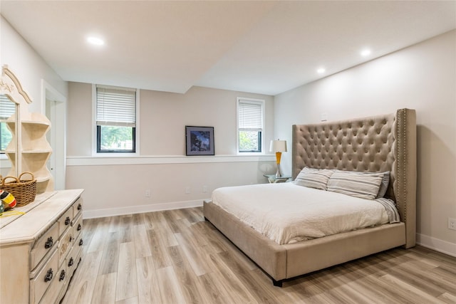 bedroom featuring light wood-type flooring