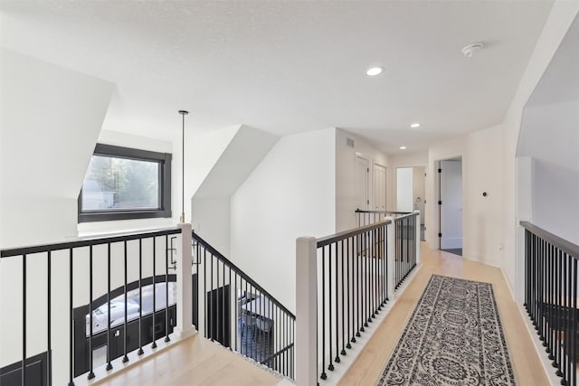 hallway featuring light hardwood / wood-style flooring