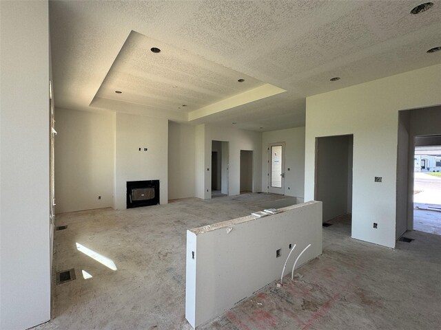 2909 Crest View Cir, Norwalk, IA 50211 - unfurnished living room featuring a textured ceiling