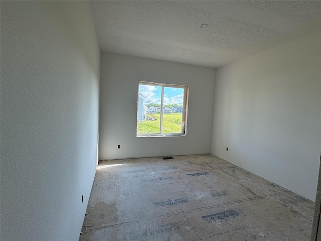 2909 Crest View Cir, Norwalk, IA 50211 - unfurnished room featuring a textured ceiling
