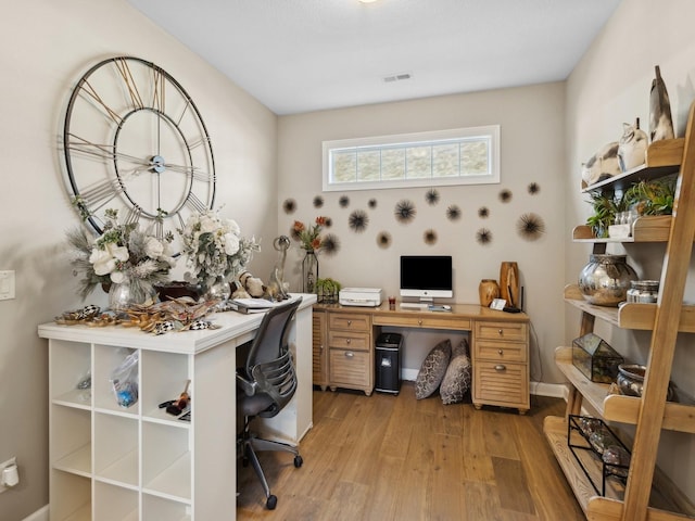 home office featuring light hardwood / wood-style flooring