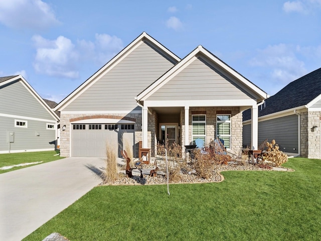 craftsman-style home featuring a porch, a front yard, and a garage