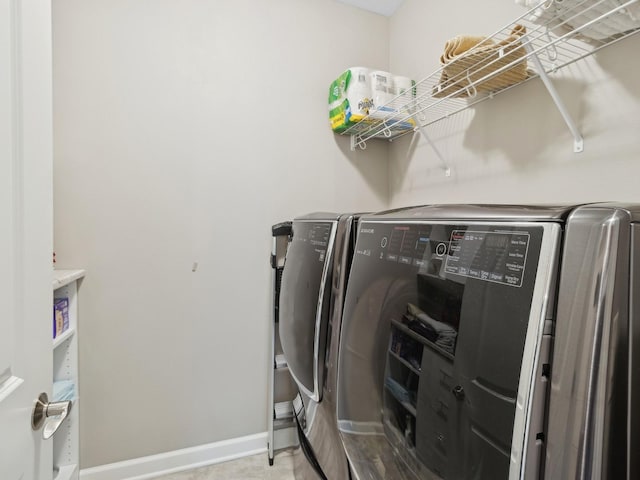 laundry area featuring washing machine and dryer