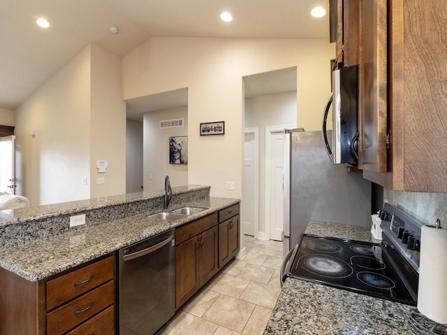 kitchen featuring sink, range with electric cooktop, vaulted ceiling, dishwasher, and light stone countertops