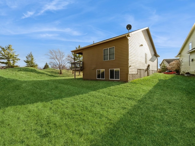 view of property exterior featuring a lawn