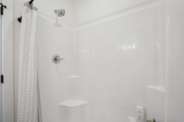 bathroom with curtained shower