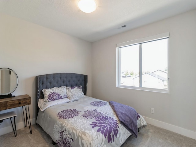 bedroom featuring carpet flooring