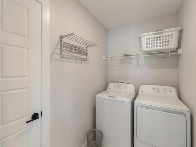 laundry area featuring washing machine and dryer