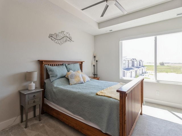 bedroom with ceiling fan and carpet flooring