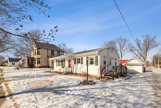 view of front of home with an outbuilding and a garage