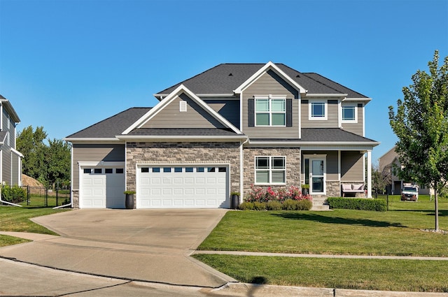 craftsman-style house with a front lawn and a garage