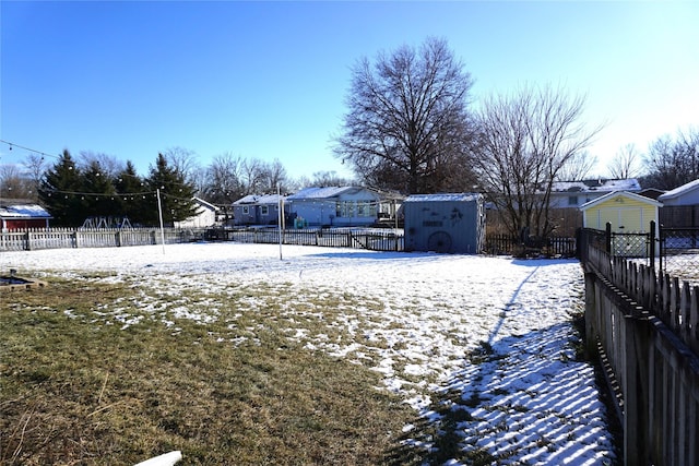 view of yard covered in snow