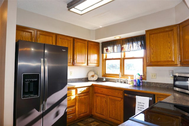 kitchen featuring stainless steel appliances and sink