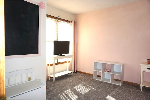 interior space featuring dark colored carpet