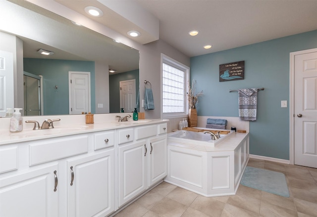 bathroom with tile patterned floors, separate shower and tub, and vanity