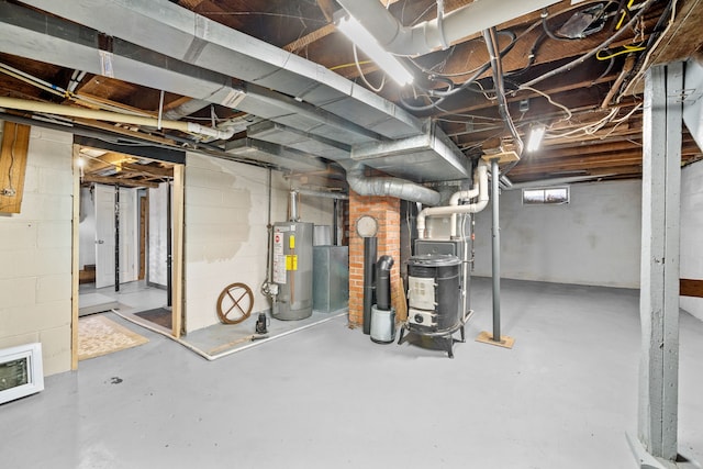 basement with heating unit and water heater