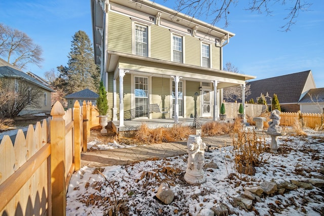 view of front of home featuring covered porch