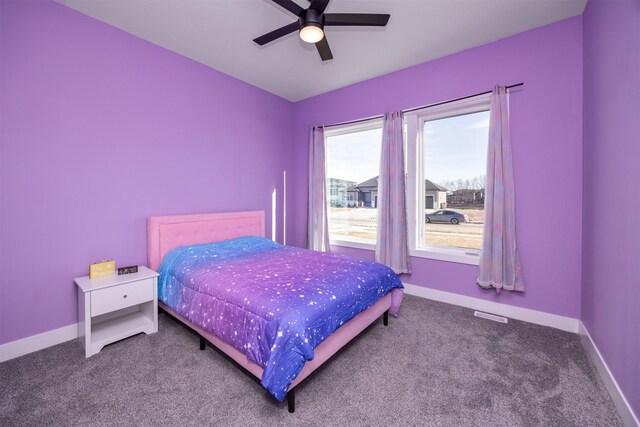 bedroom featuring ceiling fan and carpet flooring