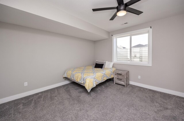 bedroom with ceiling fan and carpet floors