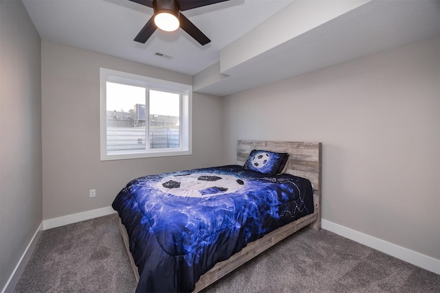 carpeted bedroom with ceiling fan