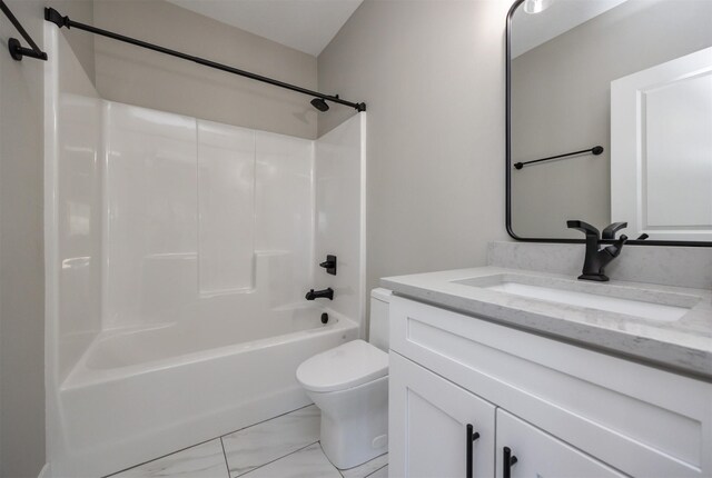 full bathroom with toilet, vanity, and tub / shower combination