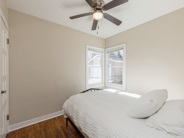 bedroom featuring ceiling fan and wood-type flooring