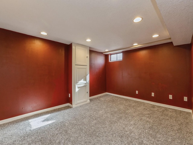 basement featuring carpet flooring