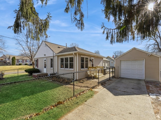 ranch-style home with a front lawn, a garage, and an outbuilding