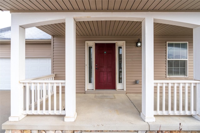 doorway to property with covered porch