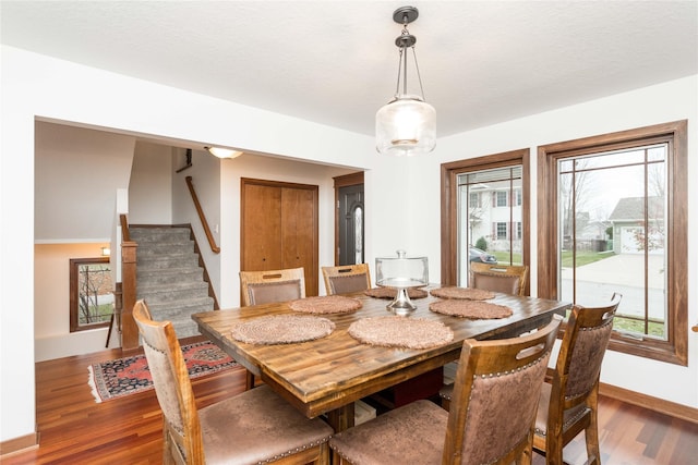 dining room featuring dark hardwood / wood-style floors