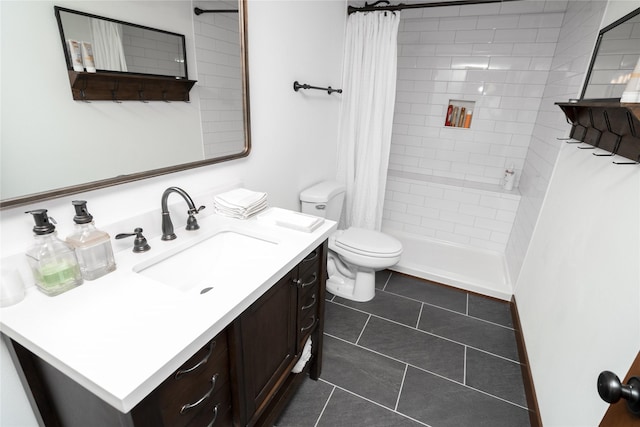 bathroom with toilet, tile patterned flooring, vanity, and curtained shower