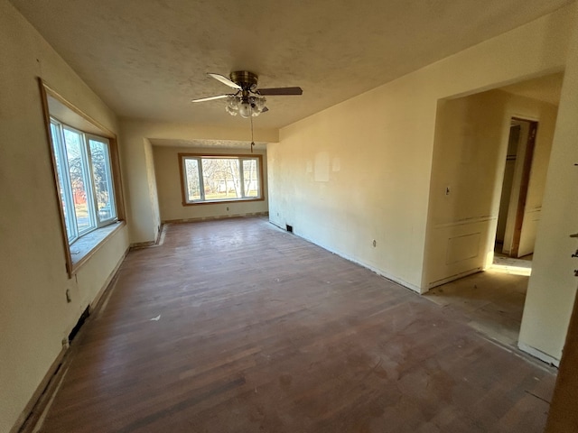 spare room with ceiling fan