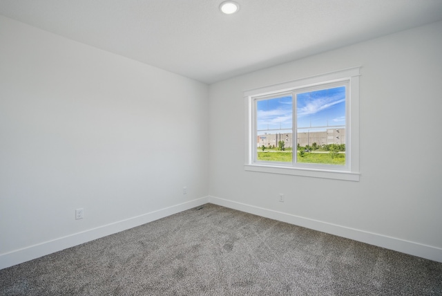 2527 Shaw St, Des Moines, IA 50317 - carpeted spare room with baseboards