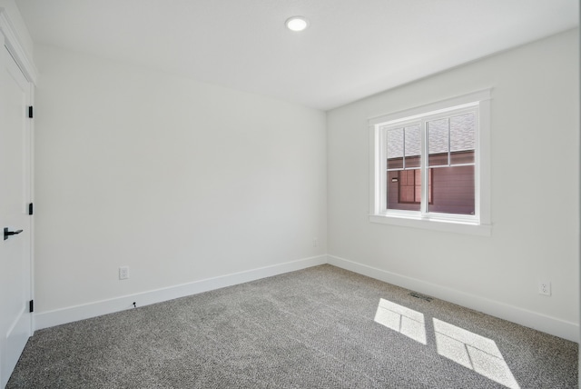 2527 Shaw St, Des Moines, IA 50317 - spare room with carpet flooring, baseboards, and recessed lighting
