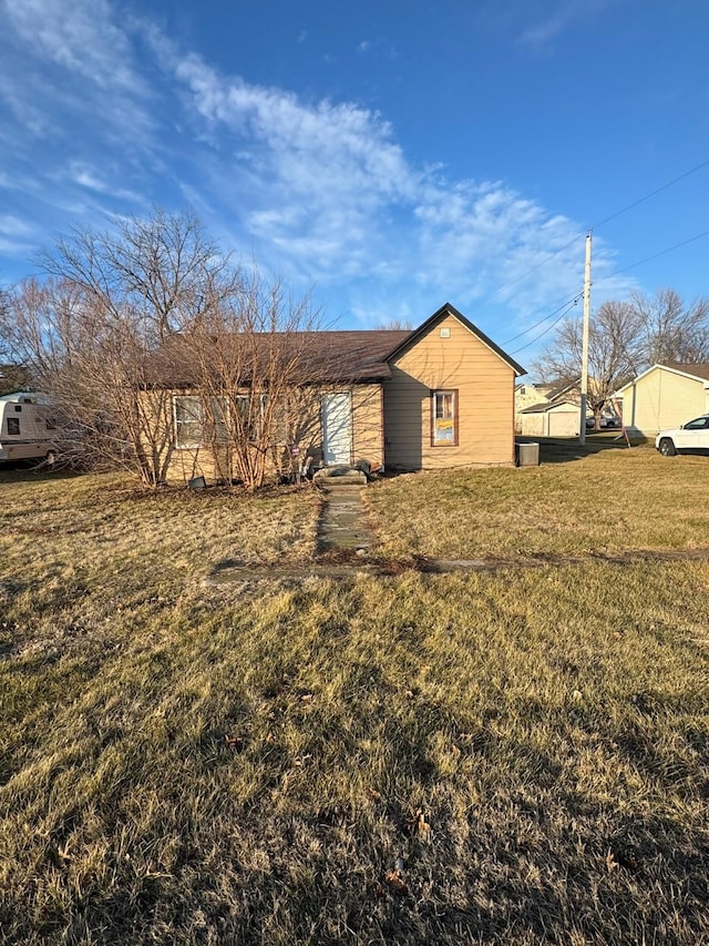 exterior space with a yard