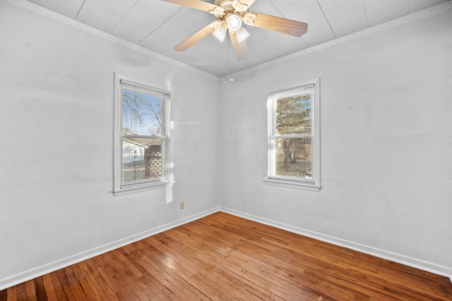 unfurnished room featuring ceiling fan, crown molding, and hardwood / wood-style flooring