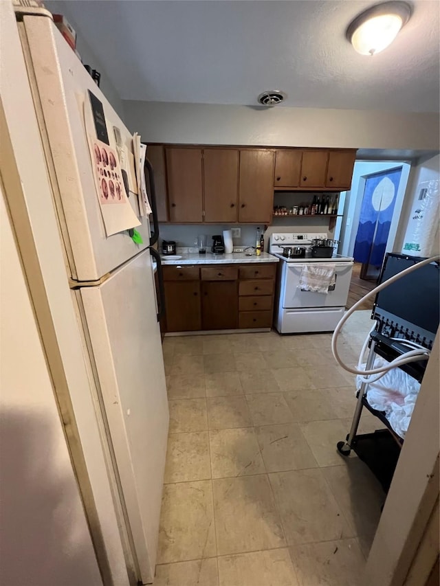 kitchen with white appliances