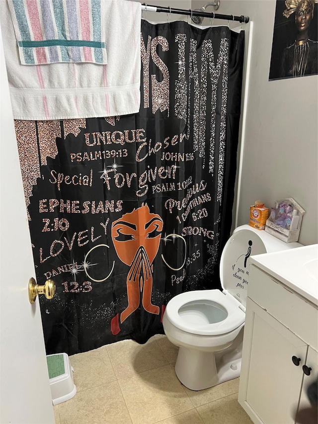 bathroom with toilet, vanity, tile patterned flooring, and a shower with curtain