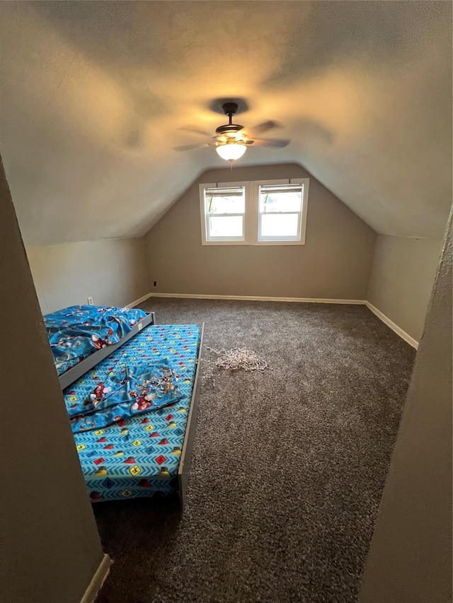 bonus room with ceiling fan, carpet, and lofted ceiling