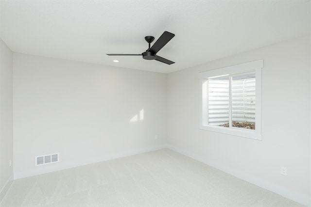 2390 Emma Ave, Des Moines, IA 50321 - empty room with carpet, ceiling fan, and recessed lighting