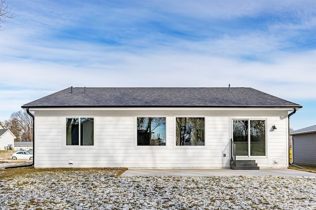 2390 Emma Ave, Des Moines, IA 50321 - rear view of house featuring entry steps, roof with shingles, and a patio