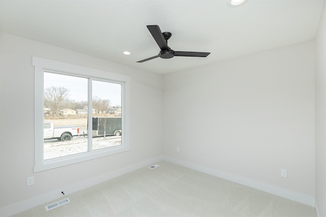 2390 Emma Ave, Des Moines, IA 50321 - carpeted spare room with ceiling fan and recessed lighting