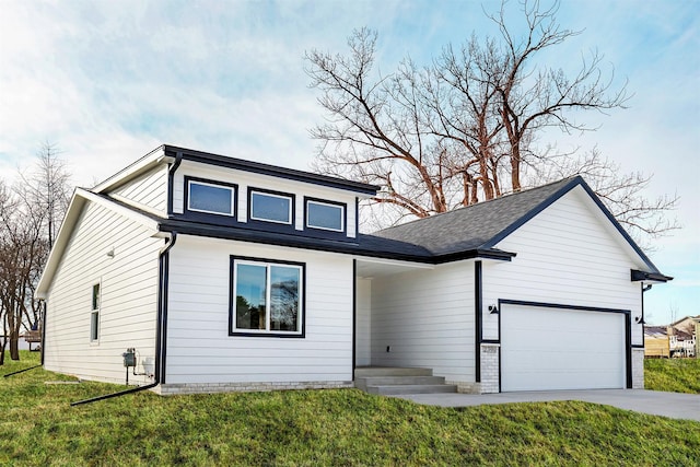 2390 Emma Ave, Des Moines, IA 50321 - view of front of home featuring a garage, concrete driveway, a front yard, and roof with shingles