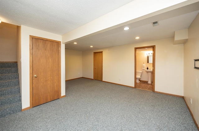 interior space featuring stairway, recessed lighting, carpet, and baseboards